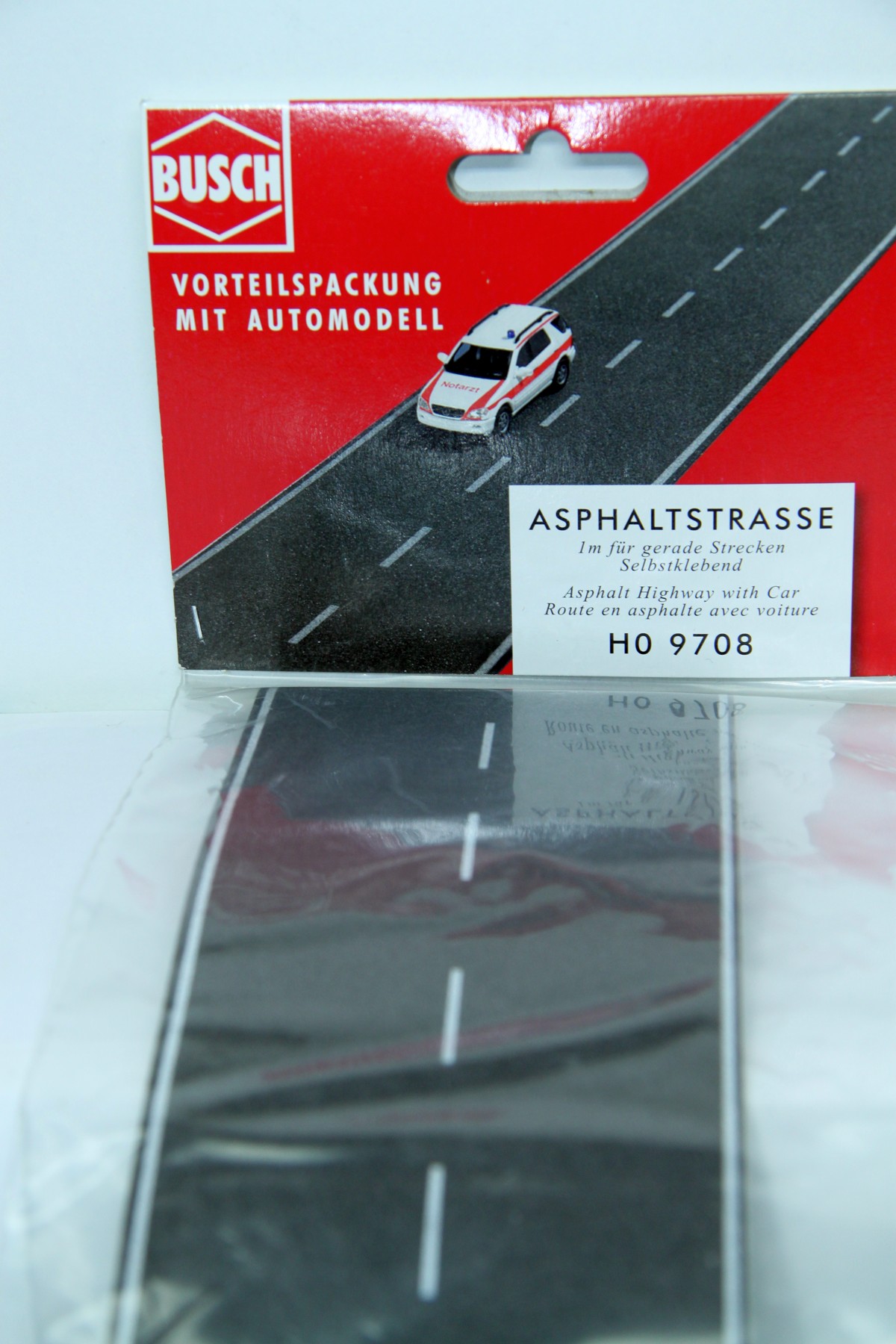 Busch-9708 , Road for straight tracks, self-adhesive, 1m with a car model, for gauge H0