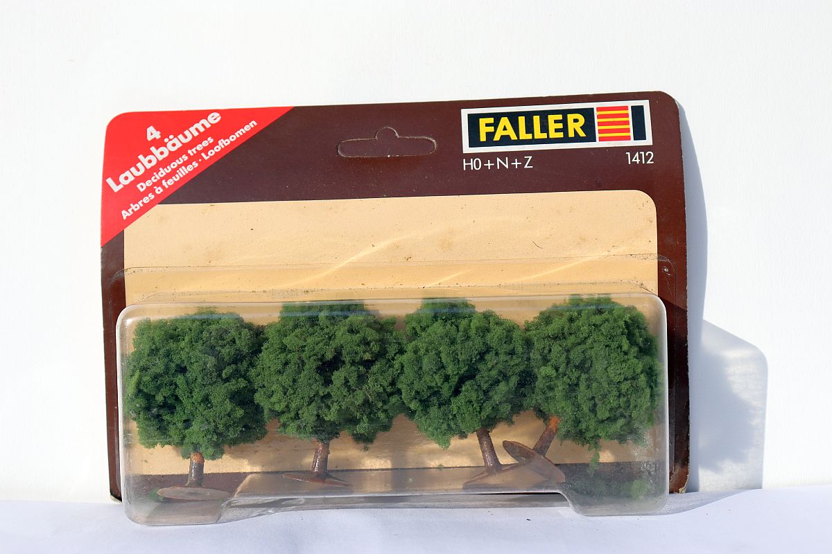 Faller 1412, 4 deciduous trees dark green, 6cm high, for H0, N, Z scale, in original packaging