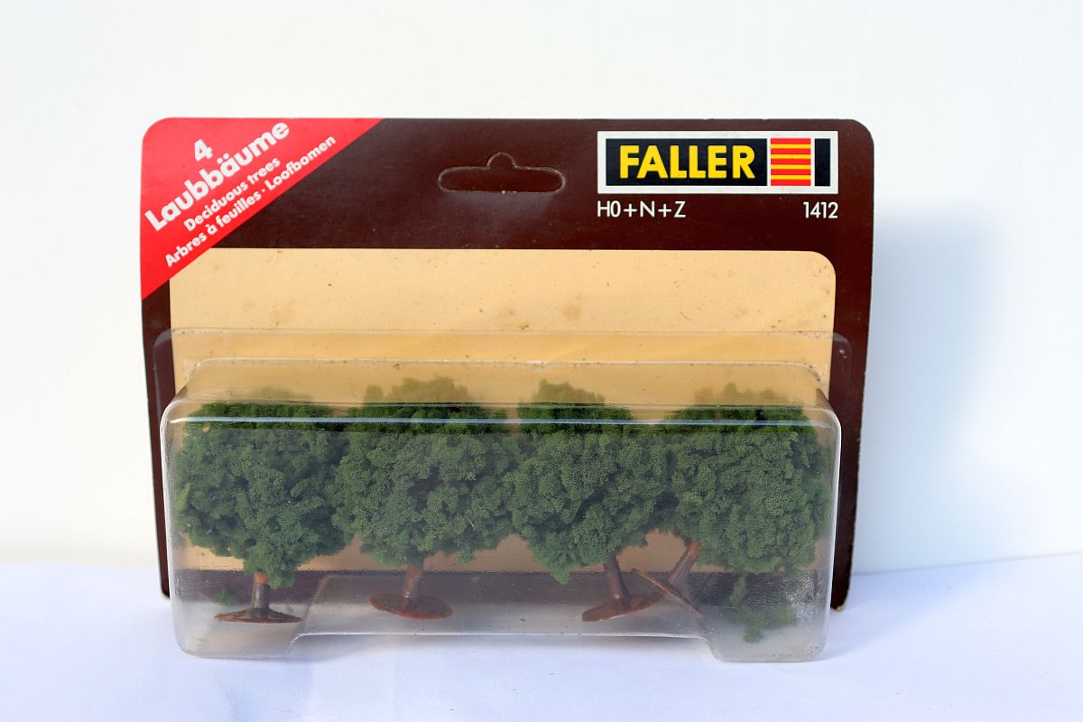 Faller 1412, 4 deciduous trees dark green, 6cm high, for H0, N, Z scale, in original packaging